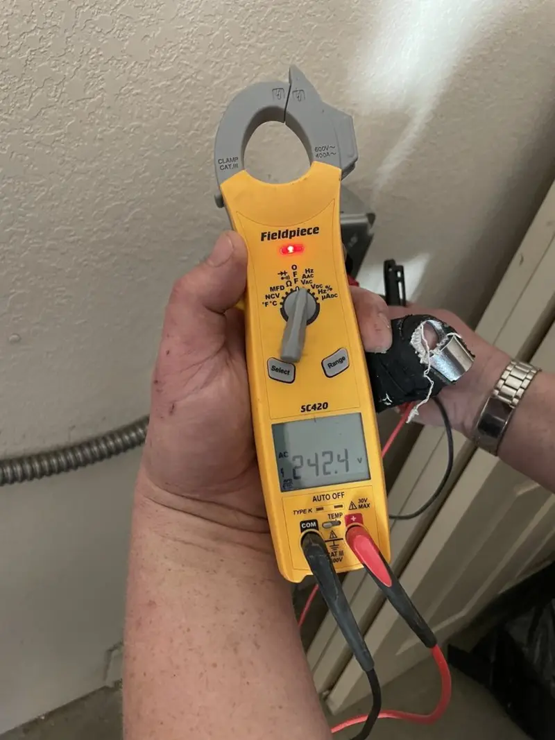 Voltage testing with clamp meter during Generator Installation in Beaufort